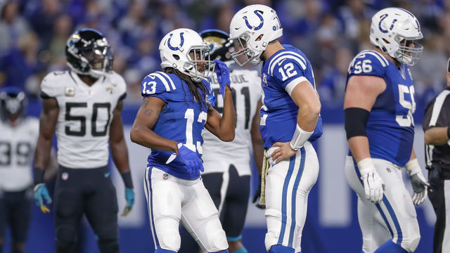 INDIANAPOLIS, IN - NOVEMBER 11: T.Y. Hilton #13 talks with Andrew Luck #12 of the Indianapolis Colts during the game against the Jacksonville Jaguars at Lucas Oil Stadium on November 11, 2018 in Indianapolis, Indiana.