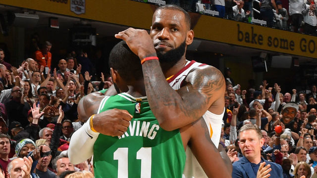 CLEVELAND, OH - OCTOBER 17: LeBron James #23 of the Cleveland Cavaliers and Kyrie Irving #11 of the Boston Celtics hug after the game on October 17, 2017 at Quicken Loans Arena in Cleveland, Ohio. NOTE TO USER: User expressly acknowledges and agrees that, by downloading and/or using this Photograph, user is consenting to the terms and conditions of the Getty Images License Agreement. Mandatory Copyright Notice: Copyright 2017 NBAE