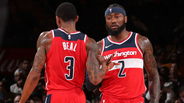 NEW YORK, NY - OCTOBER 8: Bradley Beal #3 and John Wall #2 of the Washington Wizards exchange a handshake during a pre-season game on October 8, 2018 at Madison Square Garden in New York City, New York. Mandatory Copyright Notice: Copyright 2018 NBAE