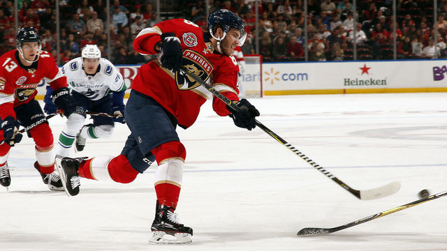 SUNRISE, FL - OCTOBER 13: Mike Hoffman #68 of the Florida Panthers shoots the puck against the Vancouver Canucks at the BB&T Center on October 13, 2018 in Sunrise, Florida.