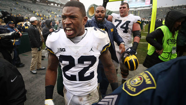EAST LANSING, MI - OCTOBER 20: Karan Higdon #22 of the Michigan Wolverines leaves the field after a 21-7 win over the Michigan State Spartans at Spartan Stadium on October 20, 2018 in East Lansing, Michigan.