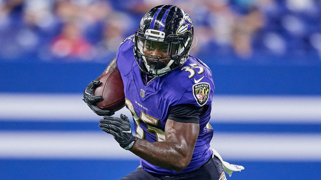 INDIANAPOLIS, IN - AUGUST 20: Baltimore Ravens running back Gus Edwards (35) runs with the football in action during the preseason NFL game between the Indianapolis Colts and the Baltimore Ravens on August 20, 2018 at Lucas Oil Stadium in Indianapolis, Indiana.