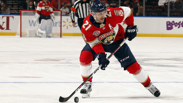 SUNRISE, FL - NOVEMBER 11: Vincent Trocheck #21 of the Florida Panthers skates with the puck against the Ottawa Senators at the BB&T Center on November 11, 2018 in Sunrise, Florida.