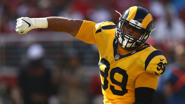 SANTA CLARA, CA - OCTOBER 21: Aaron Donald #99 of the Los Angeles Rams reacts after a sack of C.J. Beathard #3 of the San Francisco 49ers during their NFL game at Levi's Stadium on October 21, 2018 in Santa Clara, California.