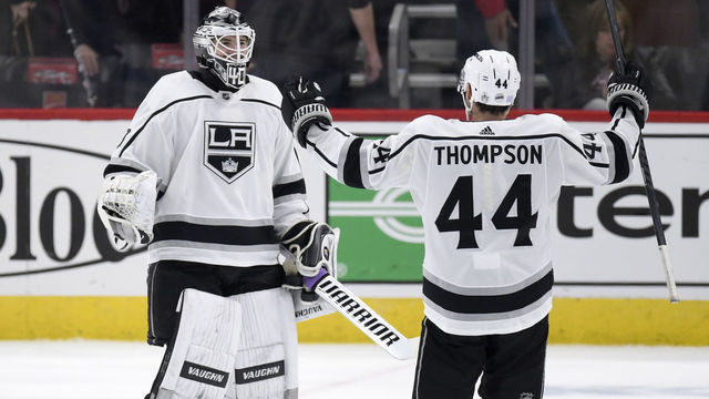 CHICAGO, IL - NOVEMBER 16: Los Angeles Kings goaltender Calvin Petersen (40) celebrates with Los Angeles Kings center Nate Thompson (44) and teammates after a win over the Chicago Blackhawks at the United Center on November 16, 2018 in Chicago, Illinois. The Kings defeated the Blackhawks 2-1 in a shootout.