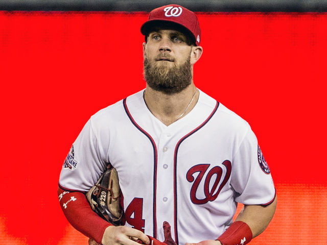 WASHINGTON, DC - SEPTEMBER 26: Washington Nationals right fielder Bryce Harper (34) returns to the dugout at the end of the seventh inning during a MLB game between the Washington Nationals and the Miami Marlins, on September 26, 2018, at Nationals Park, in Washington D.C.