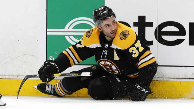 BOSTON, MA - NOVEMBER 05: Boston Bruins center Patrice Bergeron (37) looks for a call after being dumped during a game between the Boston Bruins and the Dallas Stars on November 5, 2018, at TD Garden in Boston, Massachusetts.