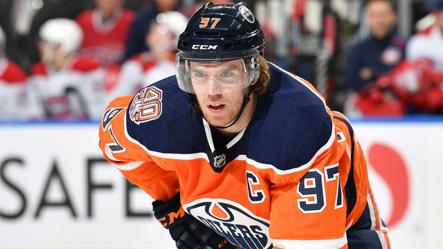 EDMONTON, AB - NOVEMBER 13: Connor McDavid #97 of the Edmonton Oilers lines up for a face off during the game against the Montreal Canadiens on November 13, 2018 at Rogers Place in Edmonton, Alberta, Canada.