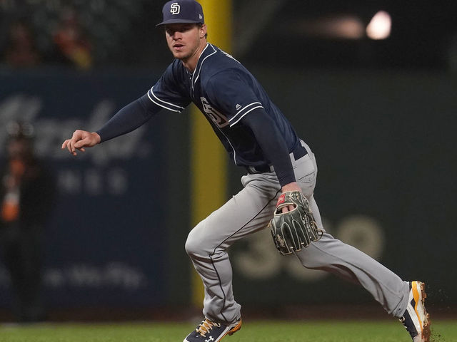 SAN FRANCISCO, CA - SEPTEMBER 25: Wil Myers #4 of the San Diego Padres reacts to a ground ball off the bat of Gorkys Hernandez #7 of the San Francisco Giants in the bottom of the seventh inning at AT&T Park on September 25, 2018 in San Francisco, California.