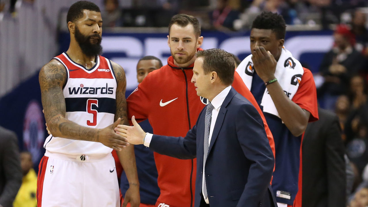WASHINGTON, DC - NOVEMBER 20: Head coach Scott Brooks of the Washington Wizards and Markieff Morris #5 of the Washington Wizards high-five against the LA Clippers during the second half at Capital One Arena on November 20, 2018 in Washington, DC.