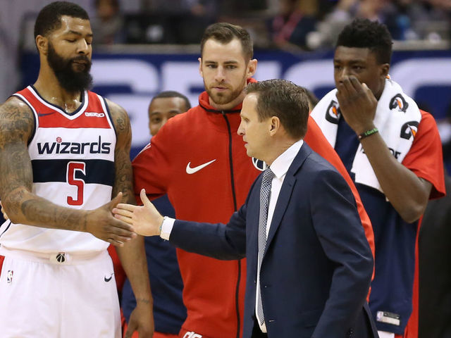 WASHINGTON, DC - NOVEMBER 20: Head coach Scott Brooks of the Washington Wizards and Markieff Morris #5 of the Washington Wizards high-five against the LA Clippers during the second half at Capital One Arena on November 20, 2018 in Washington, DC.