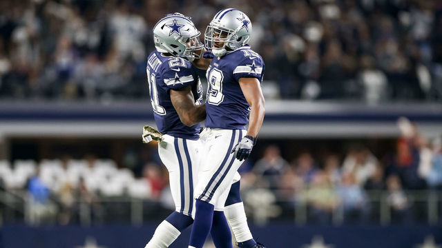 ARLINGTON, TX - NOVEMBER 05: Dallas Cowboys wide receiver Amari Cooper (19) celebrates his touchdown with running back Ezekiel Elliott (21) during the game between the Tennessee Titans and Dallas Cowboys on November 5, 2018 at AT&T Stadium in Arlington, TX.