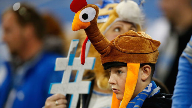 DETROIT, MI - NOVEMBER 27: A young fan with a turkey hat looks on during the Thanksgiving day game between the Detroit Lions and Chicago Bears at Ford Field on November 27, 2014 in Detroit, Michigan.