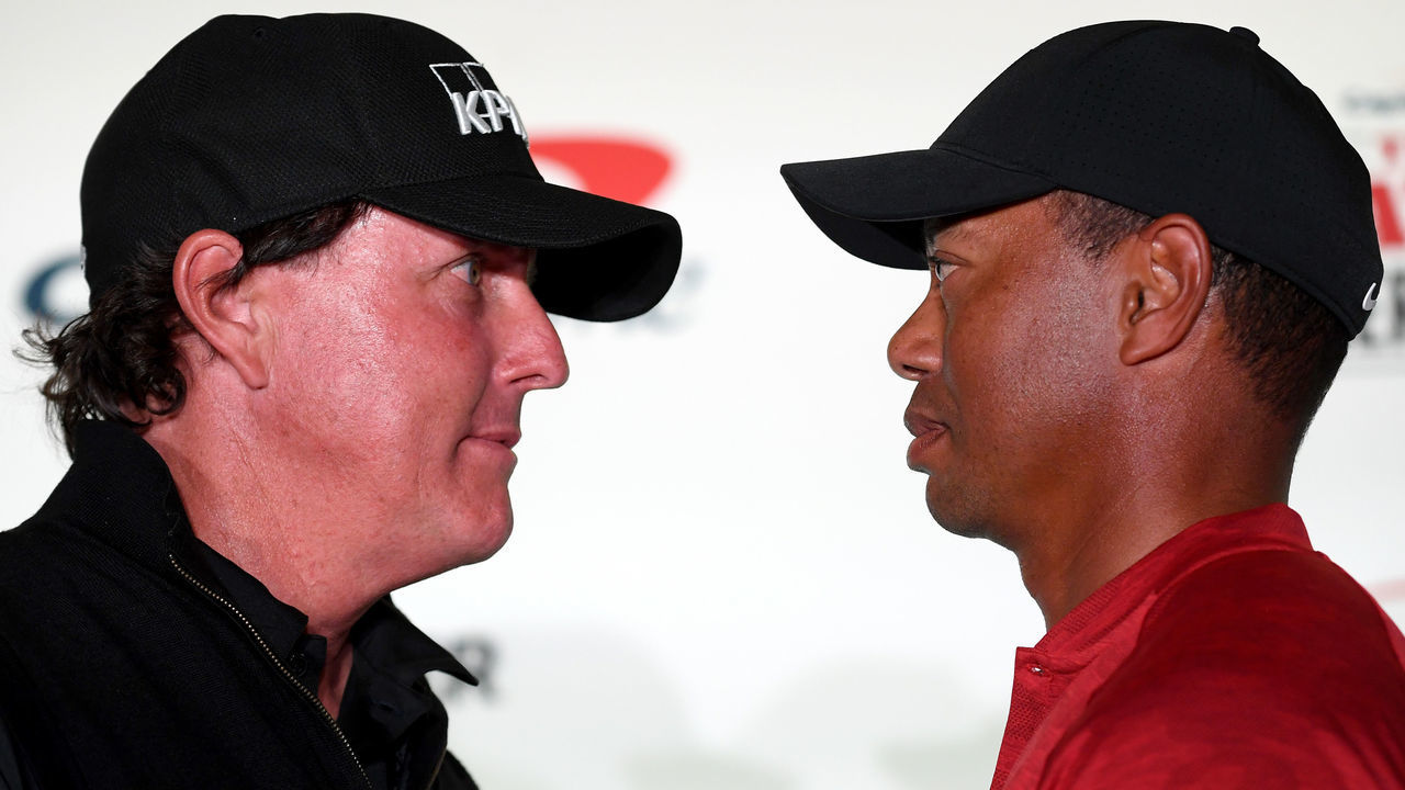 LAS VEGAS, NV - NOVEMBER 20: (L-R) Phil Mickelson and Tiger Woods face-off during a press conference before The Match at Shadow Creek Golf Course on November 20, 2018 in Las Vegas, Nevada.