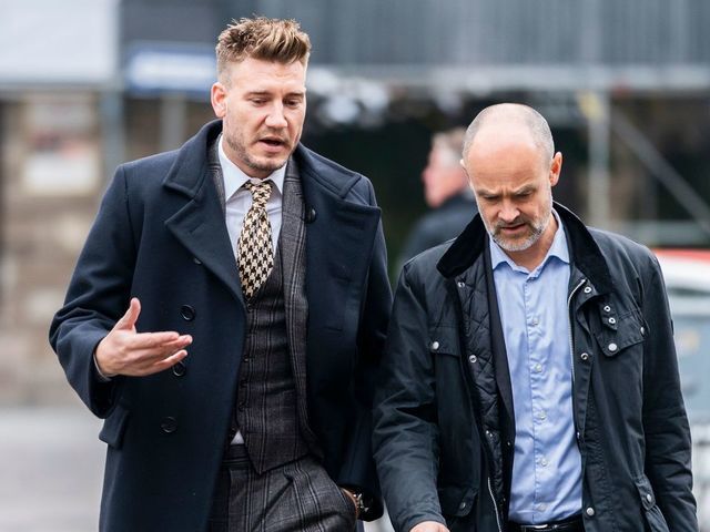 Rosenborg's Danish football player Nicklas Bendtner and lawyer Anders Nemeth arrive for a hearing at Copenhagen City Council on November 2, 2018. - Nicklas Bendtner has been charged with violence against a taxi driver in Copenhagen while the driver has been charged with attempted violence.