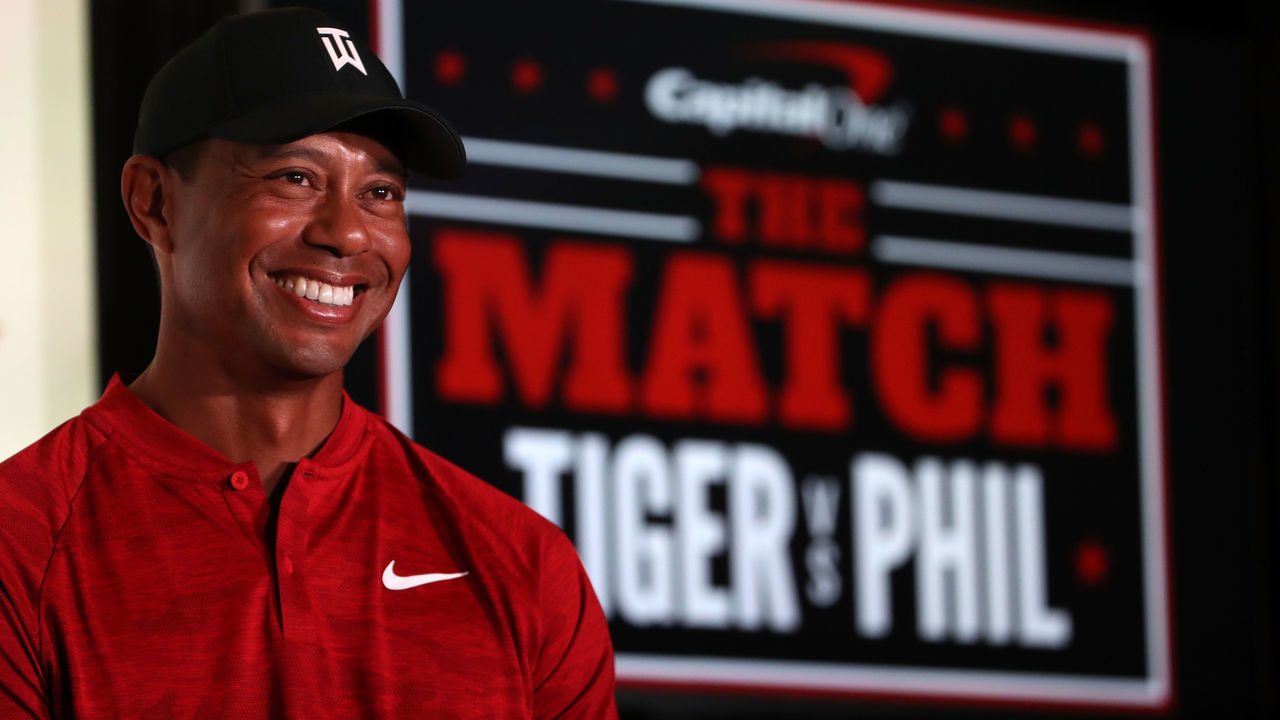 LAS VEGAS, NV - NOVEMBER 20: Tiger Woods speaks with the media alongside Phil Mickelson (not seen) during a press conference before The Match at Shadow Creek Golf Course on November 20, 2018 in Las Vegas, Nevada.
