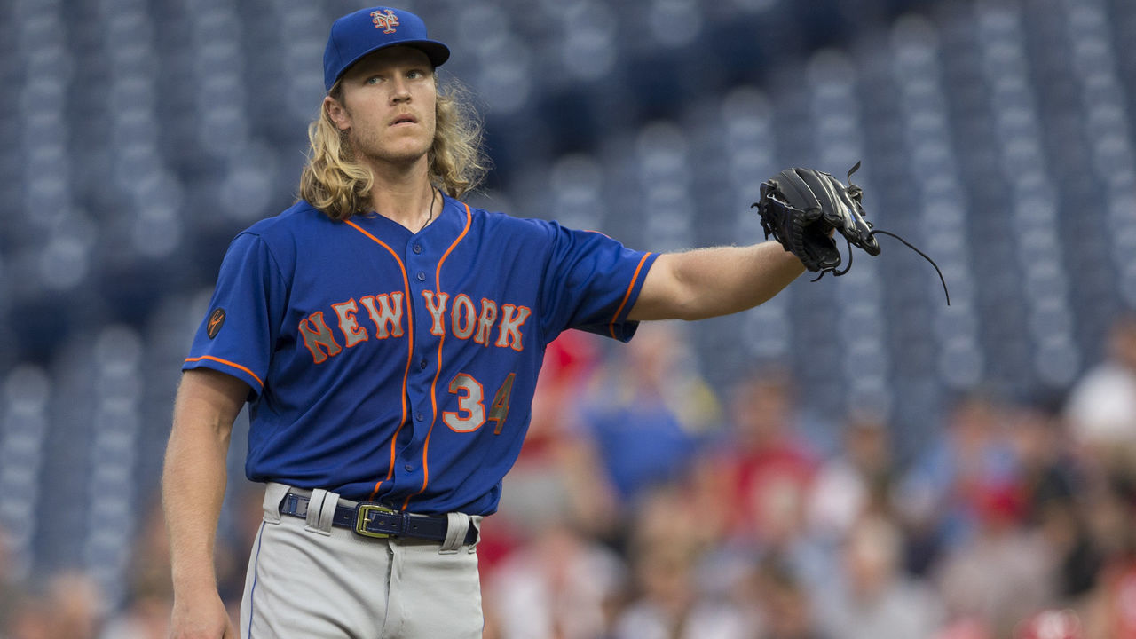 PHILADELPHIA, PA - SEPTEMBER 19: Noah Syndergaard #34 of the New York Mets looks on after allowing a solo home run to Rhys Hoskins #17 of the Philadelphia Phillies (not pictured) in the bottom of the first inning at Citizens Bank Park on September 19, 2018 in Philadelphia, Pennsylvania. The Phillies defeated the Mets 4-0.