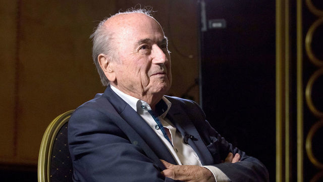 Former FIFA president Joseph 'Sepp' Blatter talks to the press at The St Regis Hotel in Moscow.