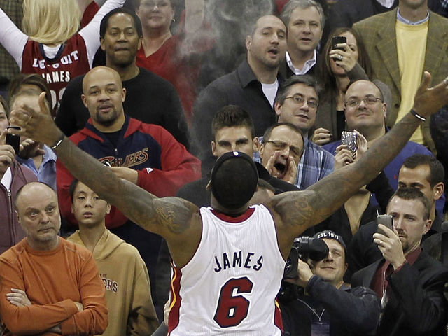 CLEVELAND, OH - DECEMBER 02: LeBron James #6 of the Miami Heat throws powder in the air prior to playing the Cleveland Cavaliers at Quicken Loans Arena on December 2, 2010 in Cleveland, Ohio.