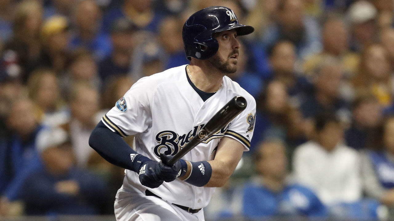 MILWUAKEE, WI - OCTOBER 20: Travis Shaw #21 of the Milwaukee Brewers doubles in the fourth inning of Game 7 of the NLCS against the Los Angeles Dodgers at Miller Park on Saturday, October, 20, 2018 in Milwaukee, Wisconsin.