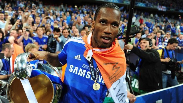 Chelsea's Didier Drogba celebrates with the UEFA Champions League trophy