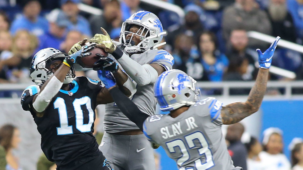 DETROIT, MI - NOVEMBER 18: Carolina Panthers wide receiver Curtis Samuel (10) and Detroit Lions safety Tracy Walker (47) battles for control of the ball during a regular season game between the Carolina Panthers and the Detroit Lions on November 18, 2018 at Ford Field in Detroit, Michigan. Detroit defeated Carolina 20-19.