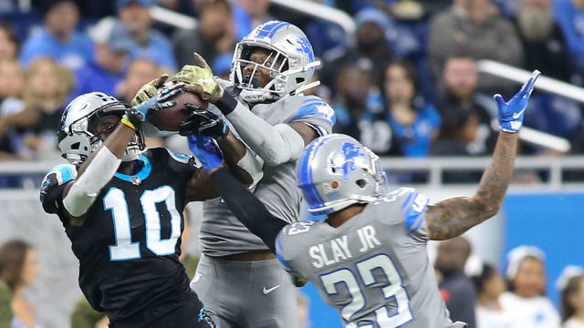 DETROIT, MI - NOVEMBER 18: Carolina Panthers wide receiver Curtis Samuel (10) and Detroit Lions safety Tracy Walker (47) battles for control of the ball during a regular season game between the Carolina Panthers and the Detroit Lions on November 18, 2018 at Ford Field in Detroit, Michigan. Detroit defeated Carolina 20-19.