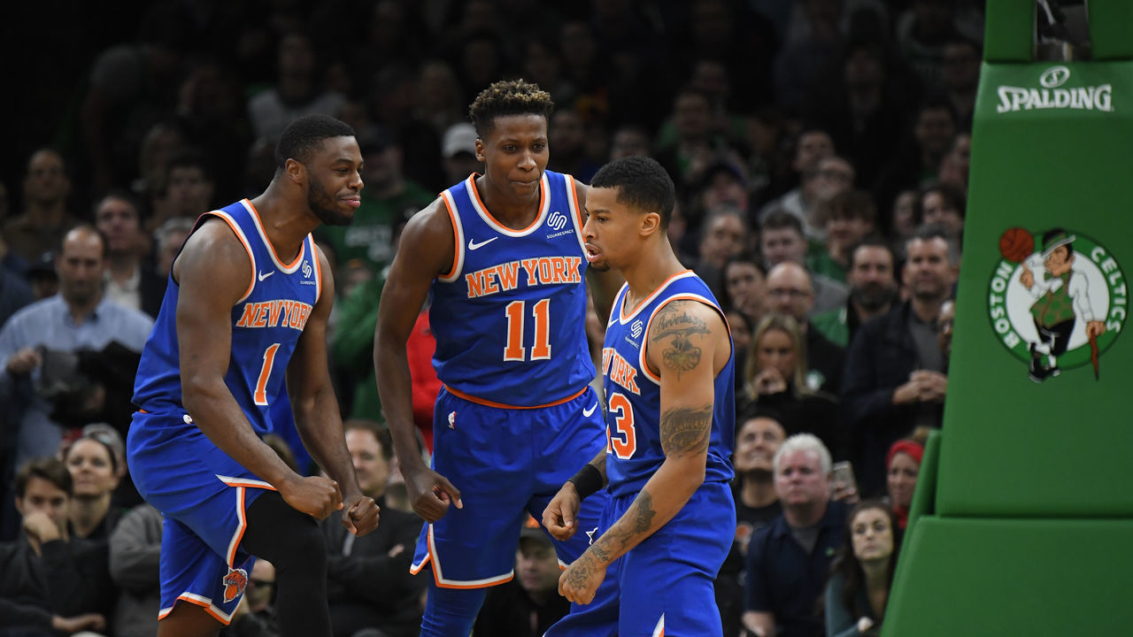 BOSTON, MA - NOVEMBER 21: Emmanuel Mudiay #1, Frank Ntilikina #11 and Trey Burke #23 of the New York Knicks react during a game against the Boston Celtics on November 21, 2018 at TD Garden in Boston, Massachusetts. NOTE TO USER: User expressly acknowledges and agrees that, by downloading and/or using this Photograph, user is consenting to the terms and conditions of the Getty Images License Agreement. Mandatory Copyright Notice: Copyright 2018 NBAE