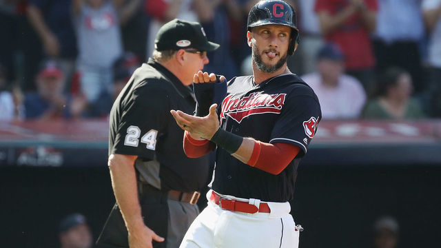 CLEVELAND, OH - OCTOBER 08: Yan Gomes #7 of the Cleveland Indians celebrates as he scores a run on a sacrifice fly ball in the third inning against the Houston Astros during Game Three of the American League Division Series at Progressive Field on October 8, 2018 in Cleveland, Ohio.
