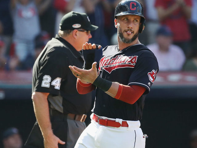 CLEVELAND, OH - OCTOBER 08: Yan Gomes #7 of the Cleveland Indians celebrates as he scores a run on a sacrifice fly ball in the third inning against the Houston Astros during Game Three of the American League Division Series at Progressive Field on October 8, 2018 in Cleveland, Ohio.
