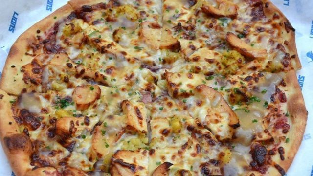 A collection of images of the Lions' Thanksgiving Day pizza