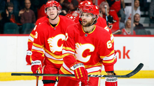 CALGARY, AB - NOVEMBER 3: Calgary Flames Left Wing Michael Frolik #67 and teammates celebrate a goal against the Chicago Blackhawks during an NHL game on November 3, 2018 at the Scotiabank Saddledome in Calgary, Alberta, Canada.