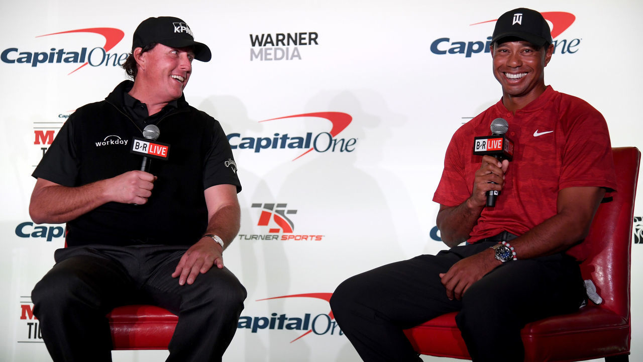 LAS VEGAS, NV - NOVEMBER 20: (L-R) Phil Mickelson and Tiger Woods speak with the media during a press conference before The Match at Shadow Creek Golf Course on November 20, 2018 in Las Vegas, Nevada.