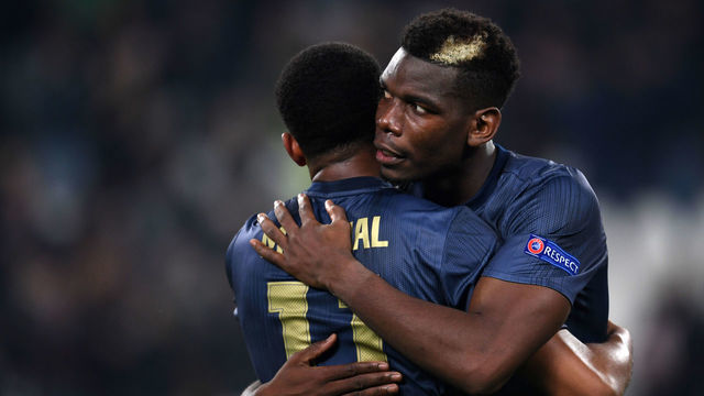 TURIN,ITALY - NOVEMBER 7: Paul Pogba (R) and Anthony Martial of Manchester United celebrate their victory after during the Group H of the UEFA Champions League between Juventus and Manchester United at Juventus Stadium on November 07, 2018 in Turin, Italy.