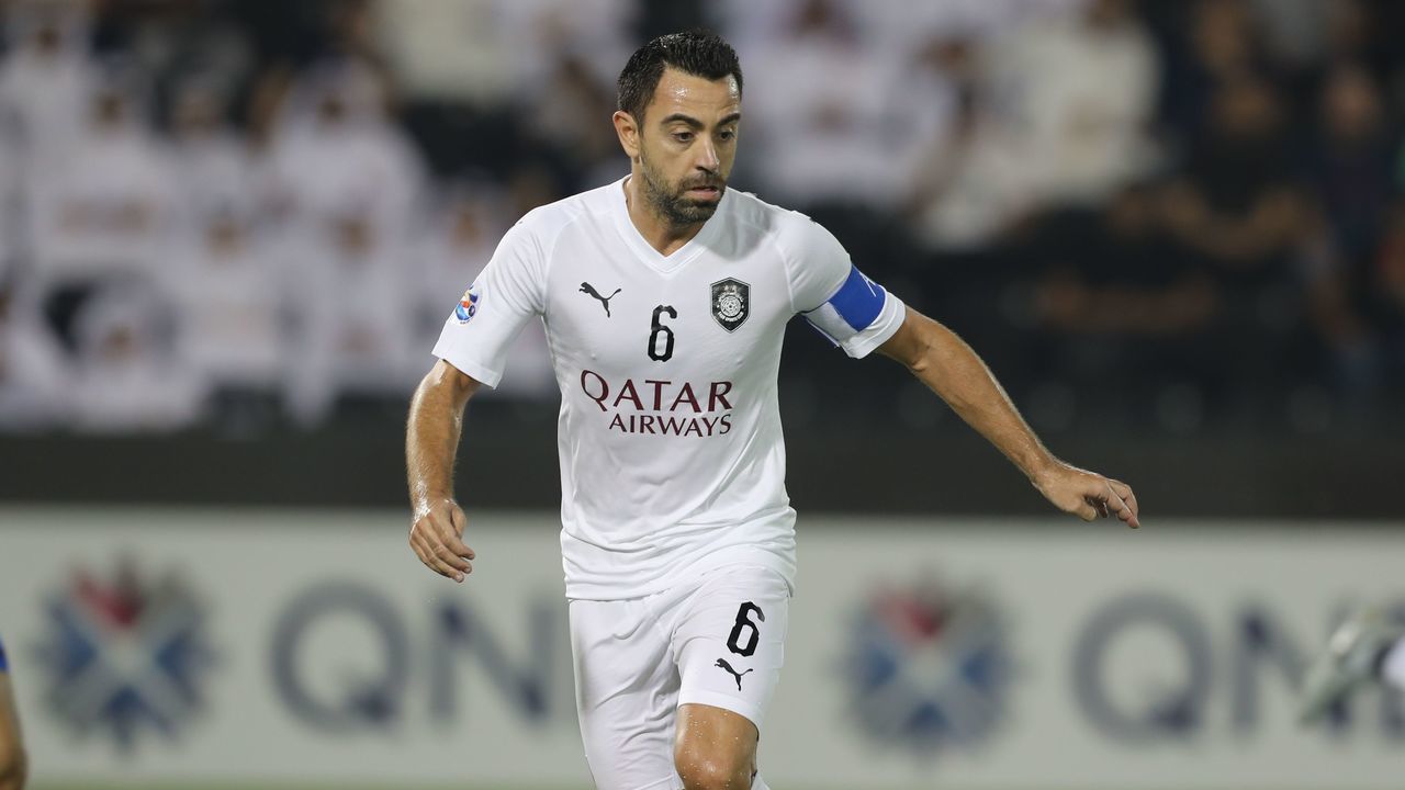 Al-Sadd's Xavi kicks the ball during the AFC Champions League quarter final match between Esteghlal FC and Al-Sadd SC at the Jassim Bin Hamad Stadium in Doha on September 17, 2018.
