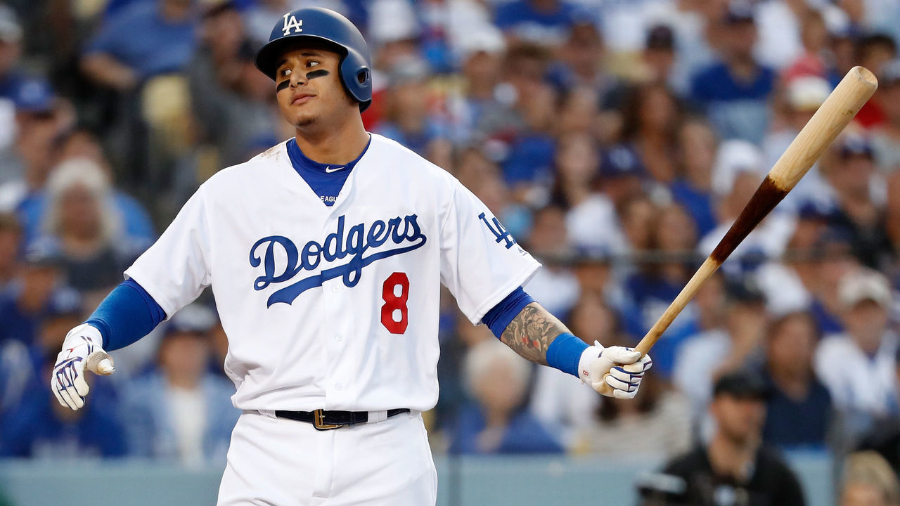 LOS ANGELES, CA - OCTOBER 28: Manny Machado #8 of the Los Angeles Dodgers reacts to his first inning strike out against the Boston Red Sox in Game Five of the 2018 World Series at Dodger Stadium on October 28, 2018 in Los Angeles, California.