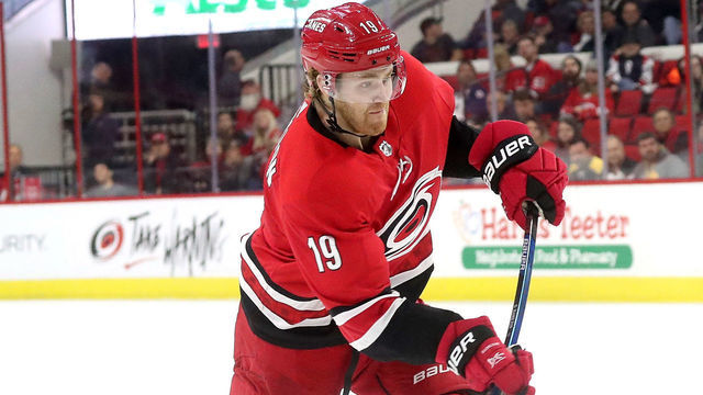 RALEIGH, NC - NOVEMBER 18: Dougie Hamilton #19 of the Carolina Hurricanes fires a slapshot during an NHL game against the New Jersey Devils on November 18, 2018 at PNC Arena in Raleigh, North Carolina.