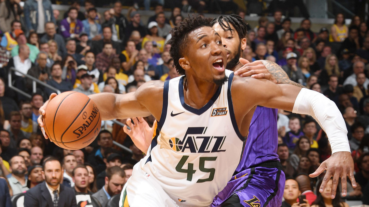 LOS ANGELES, CA - NOVEMBER 23: Donovan Mitchell #45 of the Utah Jazz handles the ball during the game against the Los Angeles Lakers on November 23, 2018 at STAPLES Center in Los Angeles, California. NOTE TO USER: User expressly acknowledges and agrees that, by downloading and/or using this Photograph, user is consenting to the terms and conditions of the Getty Images License Agreement. Mandatory Copyright Notice: Copyright 2018 NBAE