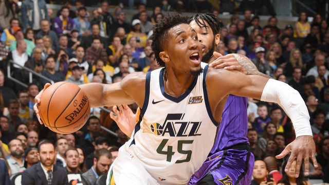 LOS ANGELES, CA - NOVEMBER 23: Donovan Mitchell #45 of the Utah Jazz handles the ball during the game against the Los Angeles Lakers on November 23, 2018 at STAPLES Center in Los Angeles, California. NOTE TO USER: User expressly acknowledges and agrees that, by downloading and/or using this Photograph, user is consenting to the terms and conditions of the Getty Images License Agreement. Mandatory Copyright Notice: Copyright 2018 NBAE
