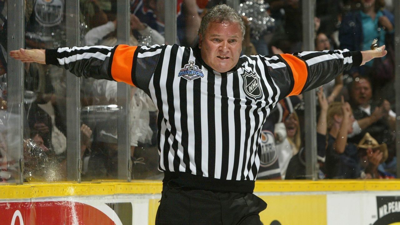 EDMONTON, AB - JUNE 10: Referee Mick McGeough waves off the possible goal scored by the Edmonton Oilers against the Carolina Hurricanes during the second period of game three of the 2006 NHL Stanley Cup Finals on June 10, 2006 at Rexall Place in Edmonton, Alberta, Canada.