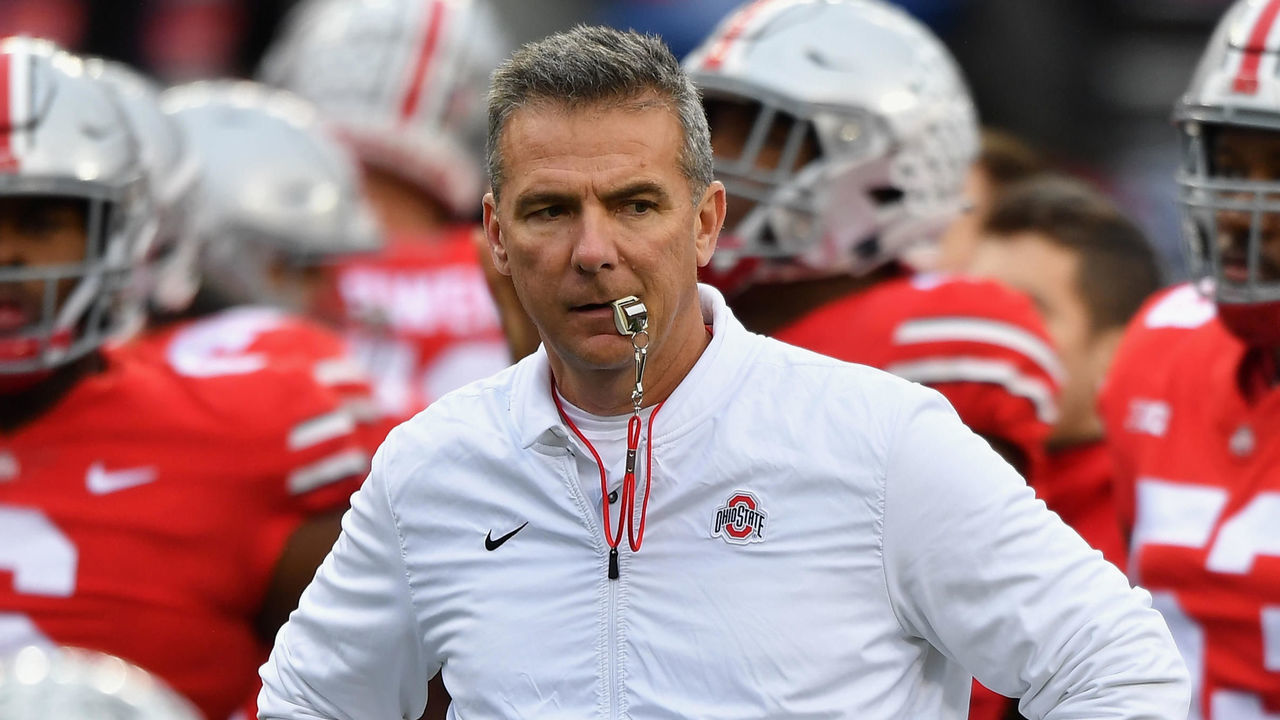 COLUMBUS, OH - NOVEMBER 24: Head Coach Urban Meyer of the Ohio State Buckeyes watches his team warm up before their game against the Michigan Wolverines at Ohio Stadium on November 24, 2018 in Columbus, Ohio.