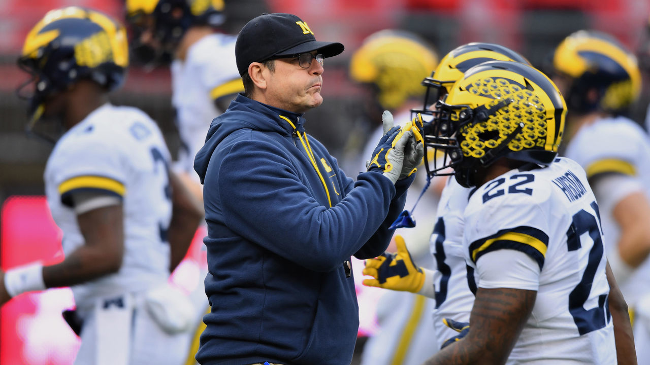 COLUMBUS, OH - NOVEMBER 24: Head Coach Jim Harbaugh of the Michigan Wolverines watches his team warm up before a game against the Ohio State Buckeyes at Ohio Stadium on November 24, 2018 in Columbus, Ohio.