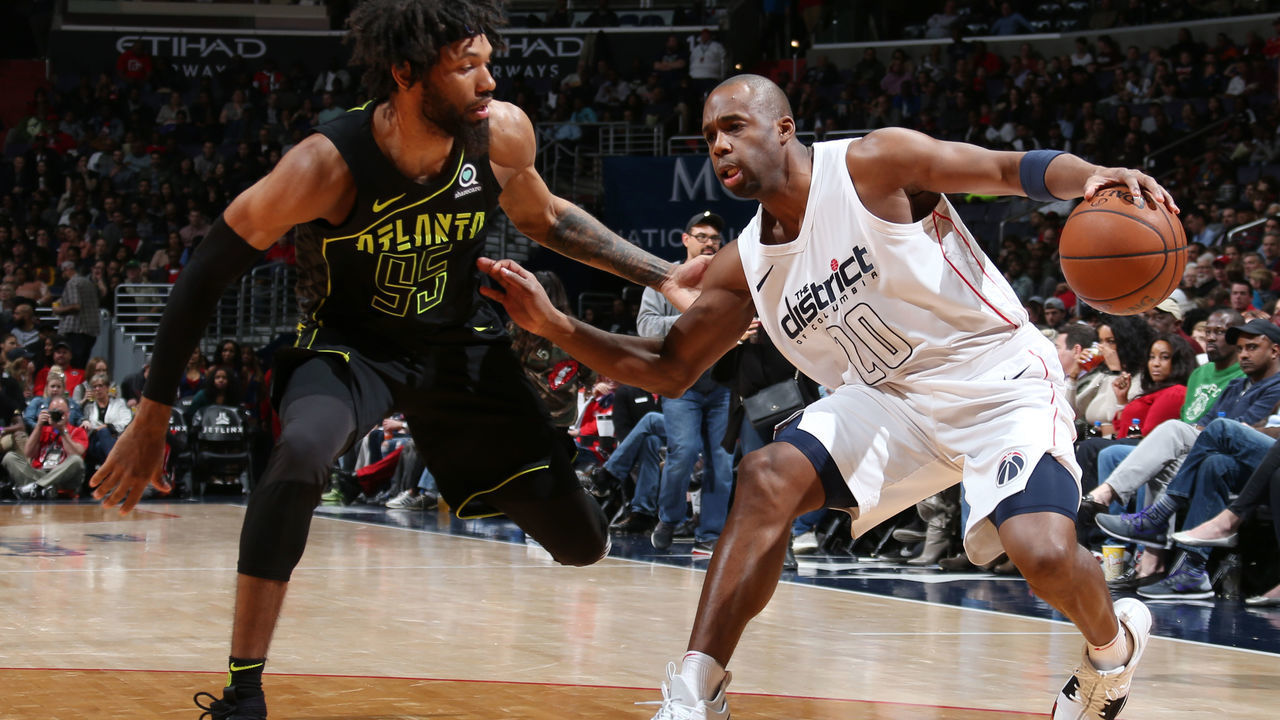 WASHINGTON, DC - APRIL 6: Jodie Meeks #20 of the Washington Wizards handles the ball against DeAndre' Bembry #95 of the Atlanta Hawks on April 6, 2018 at Capital One Arena in Washington, DC. Mandatory Copyright Notice: Copyright 2018 NBAE