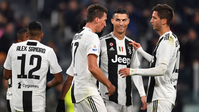 TURIN, ITALY - NOVEMBER 24: Mario Mandzukic of Juventus celebrates after his goal of 2-0 with teammates Cristiano Ronaldo and Rodrigo Bentancur during the Serie A match between Juventus and SPAL at Allianz Stadium on November 24, 2018 in Turin, Italy.