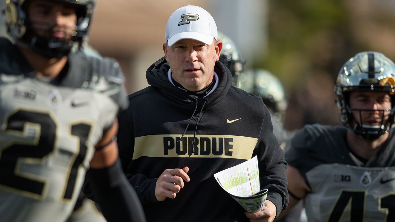 WEST LAFAYETTE, IN - NOVEMBER 03: Purdue Boilermakers head coach Jeff Brohm runs out on the field before the college football game between the Purdue Boilermakers and Iowa Hawkeyes on November 3, 2018, at Ross-Ade Stadium in West Lafayette, IN.