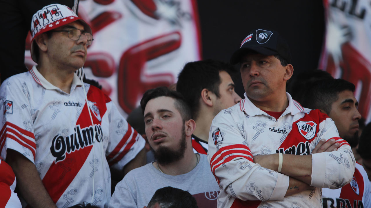 BUENOS AIRES, ARGENTINA - NOVEMBER 24: Fans of River Plate wait for the start of the match that is delayed before the second leg final match of Copa CONMEBOL Libertadores 2018 between River Plate and Boca Juniors at Estadio Monumental Antonio Vespucio Liberti on November 24, 2018 in Buenos Aires, Argentina.