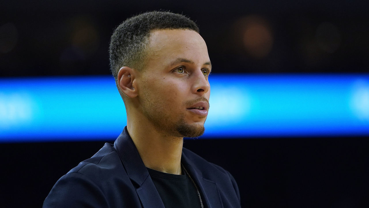 OAKLAND, CA - NOVEMBER 21: Injured guard Stephen Curry #30 of the Golden State Warriors looks on while there's a time out against the Oklahoma City Thunder during an NBA basketball game at ORACLE Arena on November 21, 2018 in Oakland, California.