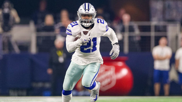 ARLINGTON, TX - NOVEMBER 22: Dallas Cowboys Running Back Ezekiel Elliott (21) runs with the ball during the Thanksgiving Day game between the Washington Redskins and Dallas Cowboys on November 22, 2018 at AT&T Stadium in Arlington, TX.