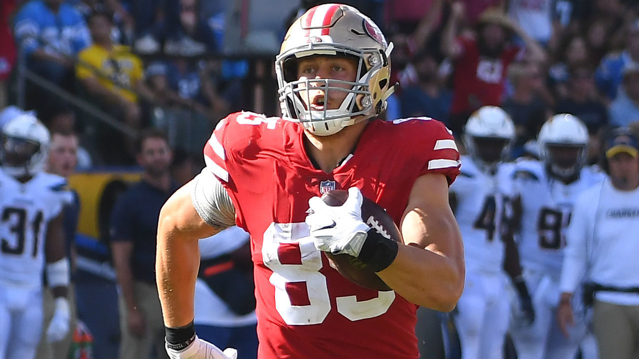 CARSON, CA - SEPTEMBER 30: George Kittle #85 of the San Francisco 49ers runs to the end zone after making a reception on an 82-yard touchdown pass in the game against the Los Angeles Chargers at StubHub Center on September 30, 2018 in Carson, California.