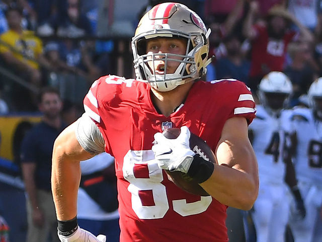 CARSON, CA - SEPTEMBER 30: George Kittle #85 of the San Francisco 49ers runs to the end zone after making a reception on an 82-yard touchdown pass in the game against the Los Angeles Chargers at StubHub Center on September 30, 2018 in Carson, California.